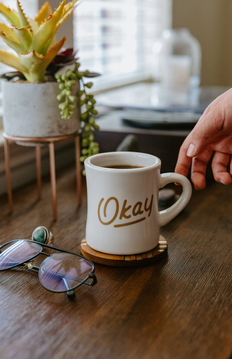 Okay Decent Human Brand "Okay" Script Coffee Mug Design by Heavy Heavy