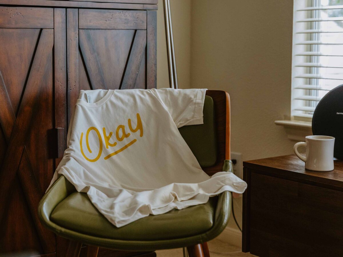 Okay Decent Human Brand "Okay" Script T-shirt Design by Heavy Heavy